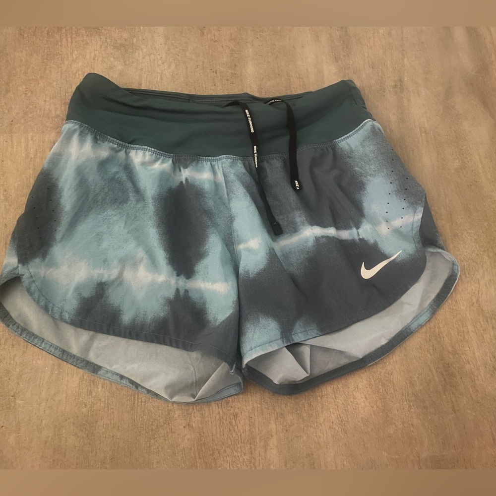 Nike running shorts size small.